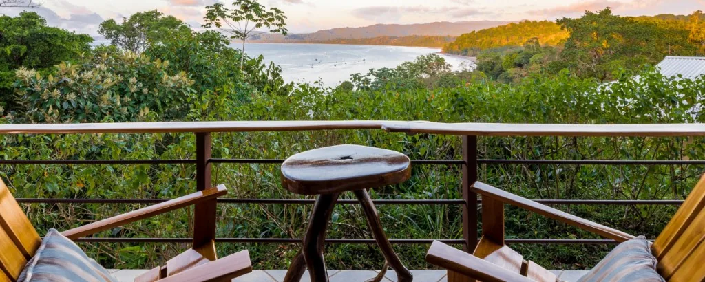A secluded thatched cabin sits among trees on the Osa Peninsula.