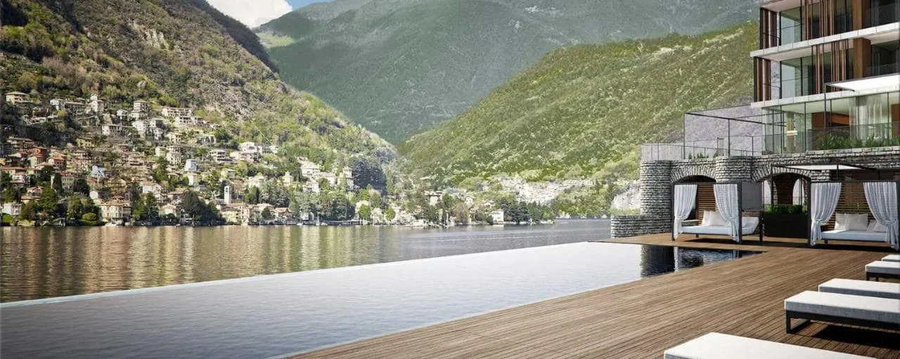Il Sereno’s modern lakeside building and infinity pool on Lake Como.